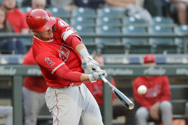 The Angels' Mike Trout hits a solo home run against the Mariners during a game in Seattle earlier this month.