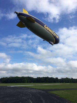 Goodyear's newest airship Wingfoot Three took off at 8:55 a.m. this morning on its maiden voyage. (GateHouse Media Ohio / Jim Mackinnon, Beacon Journal/Ohio.com)