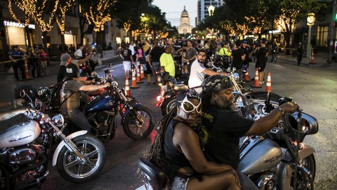 Motorcycle riders and enthusiasts participate in the annual Republic of Texas Biker Rally parade on Friday evening, June 8, 2018, in downtown Austin, Texas. (Catalin Abagiu for AMERICAN-STATESMAN)