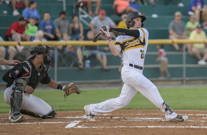 Leesburg's Walker McCleney takes a swing earlier this season. A suspended game on Saturday means the Lightning can still set the league's win-streak record. [PAUL RYAN / CORRESPONDENT]