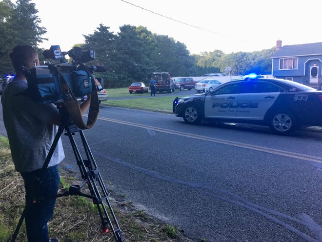 Police and news crews are on the scene of a reported shooting in Dighton. [Taunton Gazette Photo | Charles Winokoor]