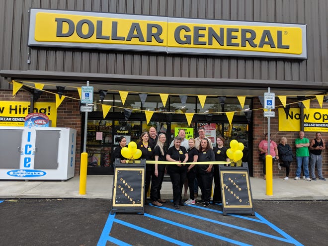 On hand to help celebrate the official grand opening of the Shalersville Dollar General were Susie Kube, assistant manager, and store manager Rosie Lorenz cutting the ribbon. Shalersville Township Trustees Frank Ruehr Jr., John Kline and Ronald Kotowski were on hand to help celebrate. Also helping with the opening was Shalersville Zoning Inspector Gregory Benner.