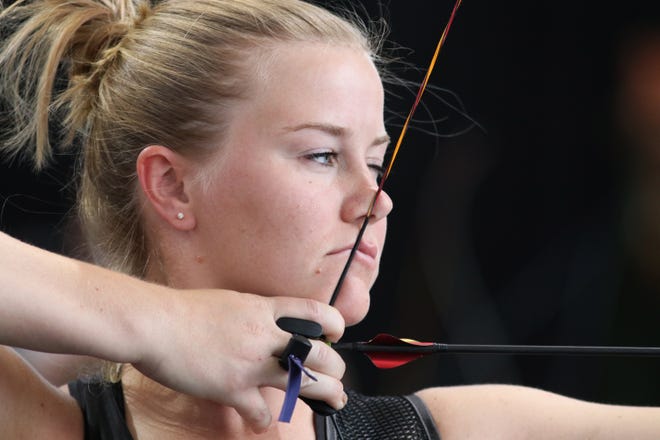 Army Specialist Lauren Jahn from Gainesville practices archery at the United States Air Force Academy near Colorado Springs, Colorado, earlier this month. Jahn competed in the 9th Department of Defense Warrior Games. [Zoe L. Smith/Grady Sports Bureau]