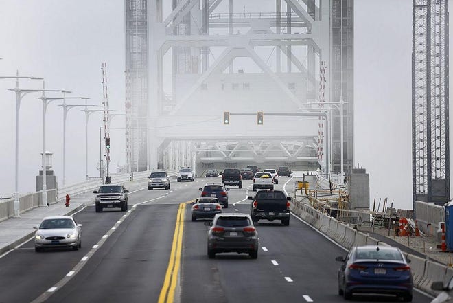 Traffic has been moving across the new Fore River Bridge since it was completed in mid-September 2017. Contractors are in the final stages of completing the removal of a temporary bridge that was built in 2002 to accommodate construction. 

[Patriot Ledger file photo]