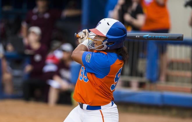 Florida's Jordan Matthews hits a walk-off three-run homer to give the Gators the 5-3 win over Texas A&M in the NCAA Super Regional on May 26 at Katie Seashole Pressly Stadium. The win sent the Gators back to the Women's College World Series. [Cyndi Chambers/Gatehouse Media]