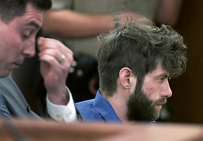 John Williams, right, accused in the fatal shooting of Somerset County Sheriff's Deputy Eugene Cole, sits with his attorney Patrick Nickerson during his initial court appearance on a murder charge in Auburn, Maine, on April 30. [Gabor Degre/The Bangor Daily News via AP, file]