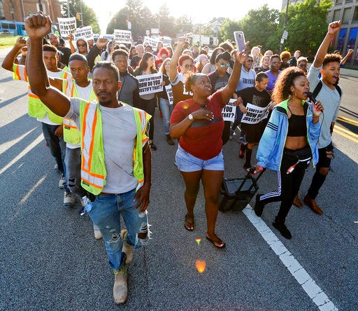 People start a protest march against the shooting death of Antwon Rose Jr. on Tuesday, June 26, 2018, in Pittsburgh. Rose was fatally shot by a police officer seconds after he fled a traffic stop June 19, in the suburb of East Pittsburgh. (AP Photo/Keith Srakocic)
