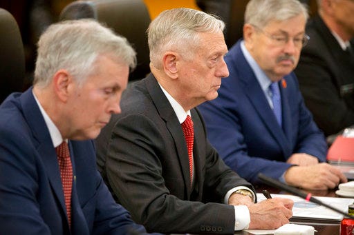 U.S. Defense Secretary Jim Mattis, center, speaks during a meeting with China's Defense Minister Wei Fenghe at the Bayi Building in Beijing, Wednesday, June 27, 2018. (AP Photo/Mark Schiefelbein, Pool)