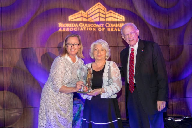 Wendy Giffin, director at Cushman & Wakefield, left, and 

Bill Roberts of Berkshire Hathaway Home Services Florida Properties Group–Commercial Division, right, are pictured with Maria Mahoney. [PHOTO PROVIDED]