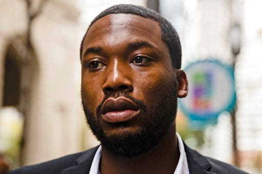 FILE – In this Nov. 6, 2017, file photo, rapper Meek Mill arrives at the Criminal Justice Center in Philadelphia. Attorneys for Mill are asking the Pennsylvania Supreme Court to remove a Philadelphia judge from his case days after she denied his new trial request. In a filing late Wednesday, June 27, 2018, Mill’s attorneys say Judge Genece Brinkley’s actions in court showed she had an opinion before hearing Mill’s request. It also says by requiring a hearing and strenuously cross-examining a witness, she strayed from how other judges had treated similar requests. (AP Photo/Matt Rourke, File)