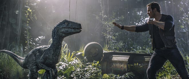 "Jurassic World: Fallen Kingdom," starring Chris Pratt, made a $148 million debut, according to final ticket sales figures Monday. [Universal Pictures]