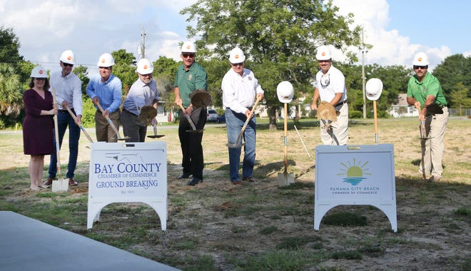 City officials break ground Thursday at the future site of the Panama City Beach City Hall. [PATTI BLAKE/THE NEWS HERALD]