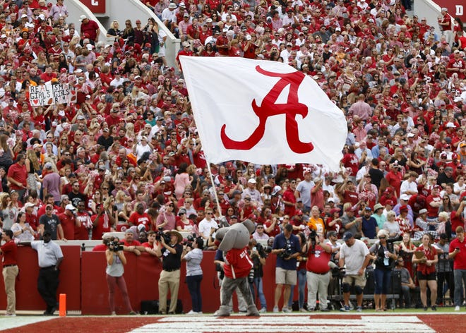 Big Al flys a scrip A flag after a touchdown during the Alabama vs. Tennessee game at Bryant-Denny Stadium in Tuscaloosa, Ala. on Saturday, Oct. 21, 2017. [Photo/Jake Arthur]