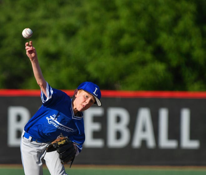 RON JOHNSON/JOURNAL STAR Twelve-year-old Joe Lamberti, pitcher for the Limestone 12-and-under travel team delivers from the artificial turf fields of the Louisville Slugger Complex.