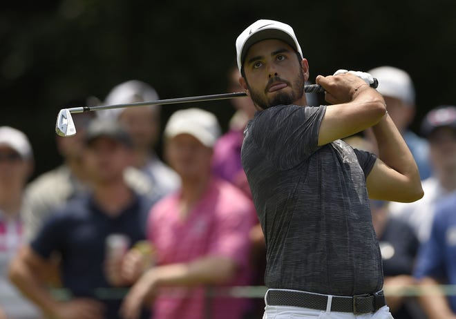 Abraham Ancer shares the lead after the third round at the Quicken Loans National in Potomac, Md. [AP photo]