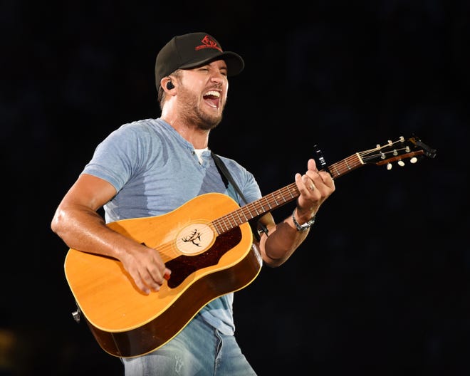 Luke Bryan sang and strummed for fans Saturday at Heinz Field. [Jason L. Nelson/For The BCT]