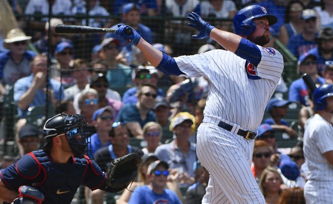 Chicago Cubs pitcher Jon Lester hits a three-run home run during the second inning of a Sunday's game against the Minnesota Twins in Chicago. [AP Photo/Matt Marton]
