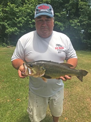 Overall winner of the 2018 Simmons Bank Big Bass Bonanza Billy Holeman Jr. poses with his 6.03 lbs winning bass. Holeman caught the bass Friday, the opening day of the 3 day tournament. [SUBMITTED PHOTO]