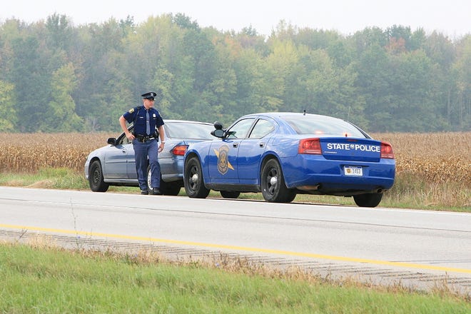A Michigan State Police trooper makes a traffic stop. According to data from the National Highway Traffic Safety Administration, the Fourth of July is one of the deadliest holidays on the road due to drunk drivers. [Courtesy/Michigan State Police]
