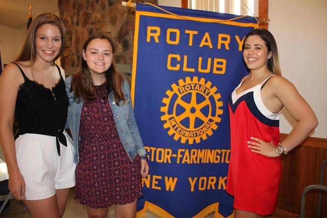 Rotary Youth Exchange students attend Victor-Farmington Rotary Club’s changeover dinner. Pictured, from left, are Veerle Beckers, Carli Vanmaaren and Claudia Deiana. [PHOTO PROVIDED/DAVE LUITWEILER]