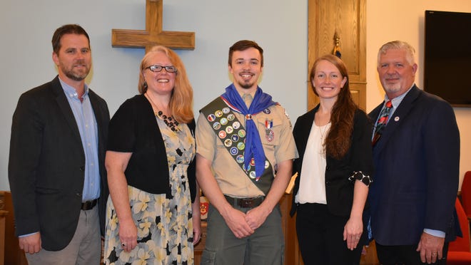 Erik Cravotta has earned the honor of Eagle Scout. Pictured from left are: Michael Albert, president and CEO of United Way of Monroe County; Jennifer Newland, legislative aide for state Rep. Maureen Madden; Erik Cravotta, Eagle Scout; Kristine Bush, chief of staff for state Sen. Mario Scavello; and John Christy, Monroe County Commissioner. [PHOTO PROVIDED]