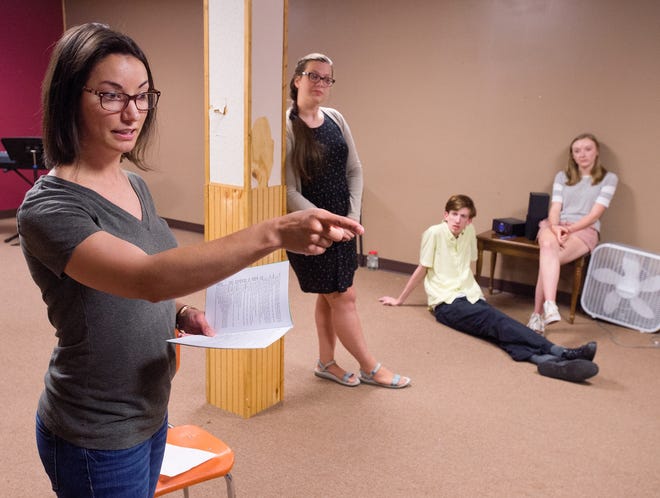 Lexington Youth Theatre Summer Camp directors June Bunce and Torrey Jackson (from left) conduct an audition workshop recently for aspiring young performers who plan to attend the camp to be held in July. [Donnie Roberts/The Dispatch]