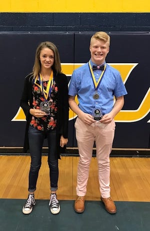 Burns Middle School presented student-athlete of the year honors to Hannah Dover (left) and Silas Tate (right). Dover played 6 sports - soccer, cross country, volleyball, basketball, track and softball. She placed first in conference in cross country, first place in the 3200, 1600 and 800 in conference and county track while also holding the Burns record for these events. She was the captain of the soccer team scoring 20 goals and her batting average in softball was .469. Tate played played 3 sports – football, basketball and wrestling. He was a two-way starter on the football team, finished undefeated 19-0 on the wrestling team and holds the record for fastest pin at Burns of 7 seconds and was the 2018 State Champion at 160 pounds.