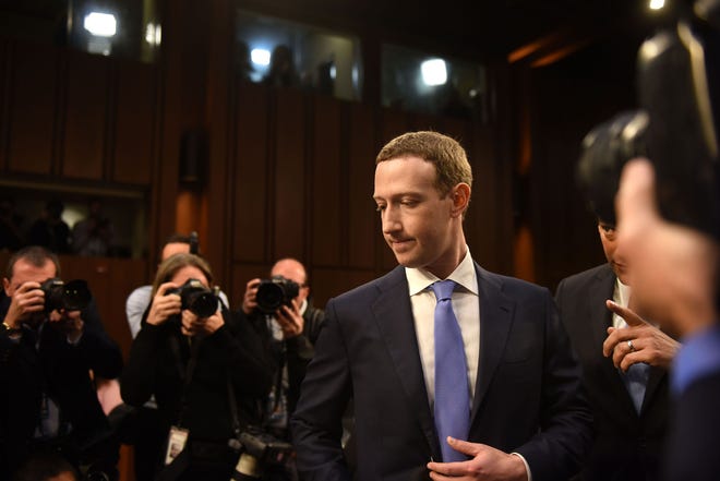 Facebook founder Mark Zuckerberg arrives for a Senate committee hearing in Washington, D.C., on April 10. MUST CREDIT: Washington Post photo by Michael Robinson Chavez