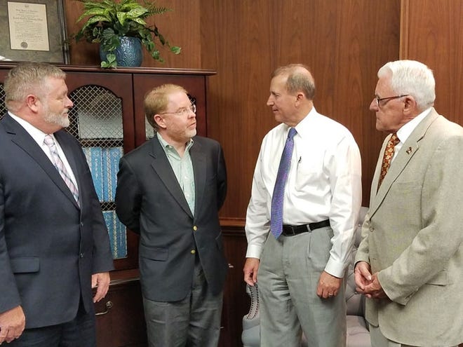 N.C. Community College System President Peter Hans visited Coastal Carolina Community College on Thursday and met with local legislators. Pictured left to right are: CCCC President David Heatherly, Hans, N.C. Sen. Harry Brown and N.C. Rep. George Cleveland. [Jannette Pippin/The Daily News]