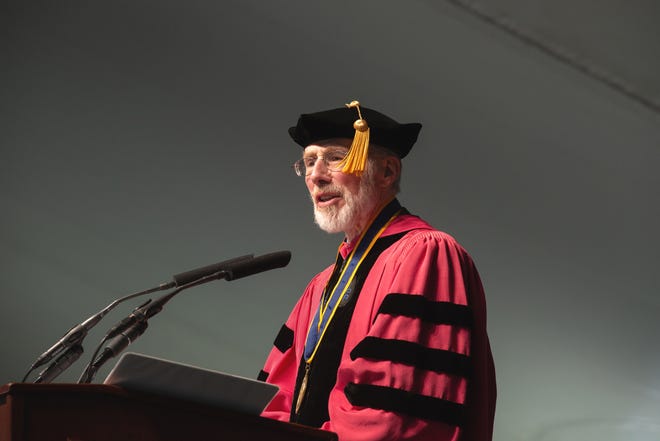 Roger Williams University President Donald J. Farish speaks duing the 2018 commencement ceremony on May 19. He recently announced plans to retire in June 2019 before he died unexpectedly Thursday at a Boston hospital. [PHOTO BY JULIE BRIGIDI COURTESY OF RWU]