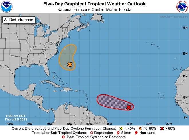 The National Hurricane Center is tracking two systems in the Atlantic Ocean, one of which is near Bermuda and the other roughly midway between Africa and the Caribbean. [CONTRIBUTED PHOTO]