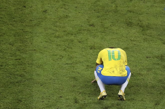Brazil's Neymar reacts at the end of the quarterfinal match between Brazil and Belgium at the 2018 soccer World Cup in Russia on Friday. (AP Photo/Thanassis Stavrakis)