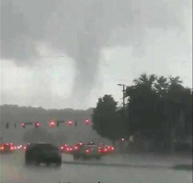 This image of the July 4 twister, dubbed a low-power EF-0 by the National Weather Service, was posted on Facebook. [Facebook]