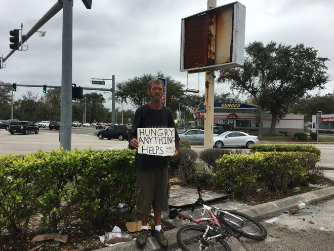 Christopher Haslam, who said he lives in a homeless camp near Derbyshire Road, said local assistance agencies have failed him and he'll keep panhandling to survive. [News-Journal/Eileen Zaffiro-Kean]