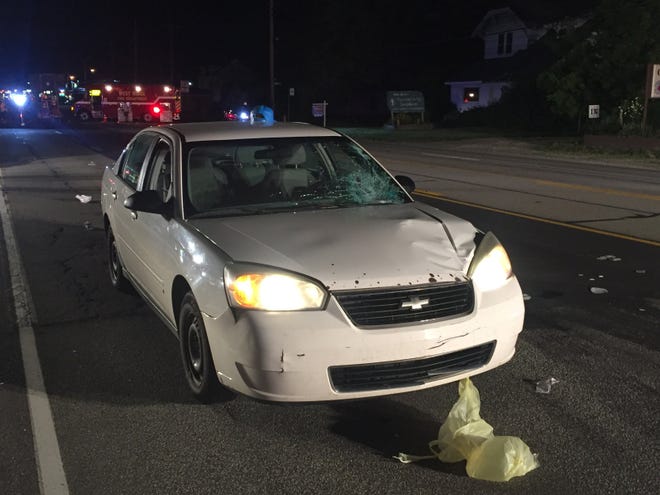 A woman was struck and killed by this vehicle on West Ridge Road on Friday night. RON LEONARDI/ETN
