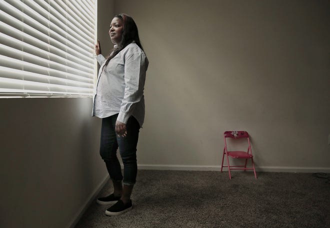 Shanara Mobley at her Northside Jacksonville home 20 years after her first-born daughter, Kamiyah, was kidnapped from the hospital as a newborn. [Bob Self/Florida Times-Union]