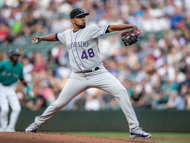 Colorado Rockies starting pitcher German Marquez didn't allow the Seattle Mariners a hit until the fourth inning Friday in a 7-1 win at Safeco Field. [AP Photo/Stephen Brashear]