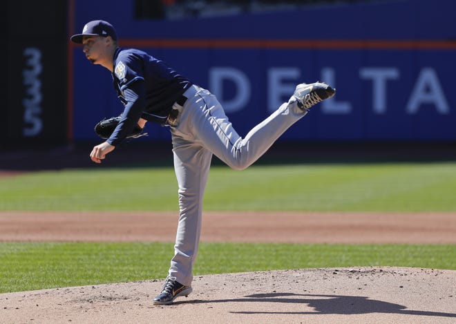 Tampa Bay Rays starting pitcher Blake Snell delivers to the New York Mets during the first inning Saturday in New York. Snell struck out nine in 7 1/3 innings as the Rays blanked the Mets, 3-0. [The Associated Press / Julie Jacobson]