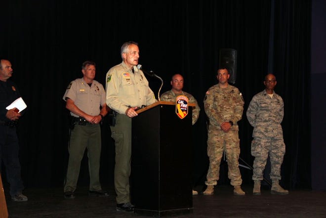 Siskiyou County Sheriff Jon Lopey speaks to the crowd during a community update on the Klamathon Fire on Saturday, July 7. He was joined by personnel from fire and law enforcement agencies throughout the state.