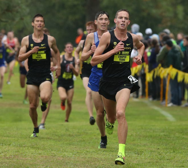 Cooper Teare (right) was Oregon's top finisher at the Bill Dellinger Invitational at the Springfield Country Club in September. [Chris Pietsch/The Register-Guard]