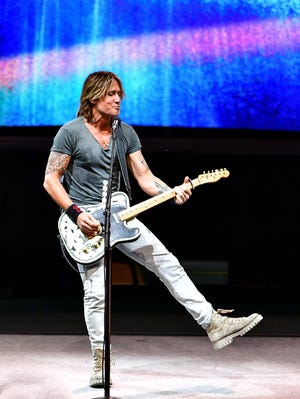 Keith Urban jams out Sunday night at CMAC. [SCOTTY HAINES/MESSENGER POST MEDIA FREELANCER]