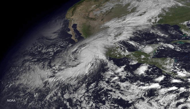 This satellite image of Hurricane Patricia was taken on Oct. 23, 2015, and released by the National Oceanic and Atmospheric Administration. At one point, the storm had sustained winds of 215 mph. [NOAA via AP]