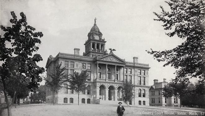 Judging by the landscape, it is believed this photo by LaVern F. Wheeler is one of the first images capturing the magnificent new Ionia County Courthouse. On the far right is the jail house built of brick and Ionia sandstone that was completed on January 1, 1881. The photo is part of the collection of the Ionia County Historical Society. [CONTRIBUTED]