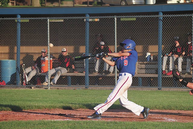 Kato Dougan swings at a pitch at a recent game. PHOTO BY LIBBIE RANDALL/THE PERRY CHIEF