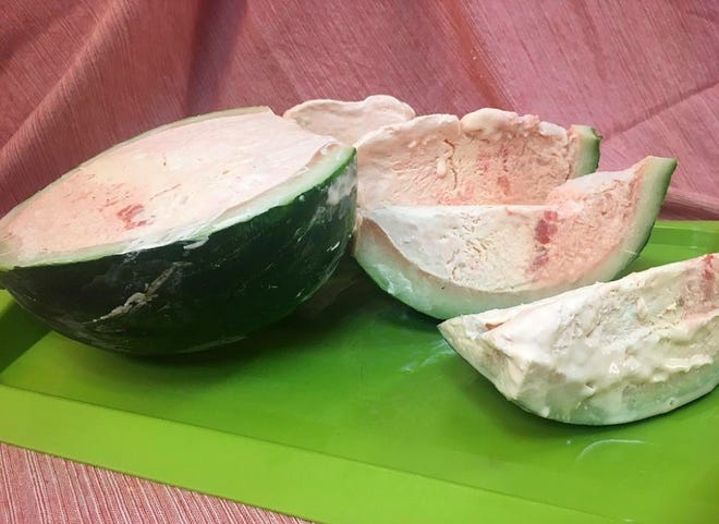 Watermelon Ice Cream frozen inside a watermelon shell is a treat for a crowd. [Jennie Geisler]