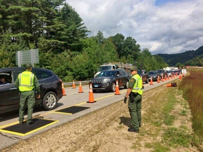The Dover City Council voted on a resolution that calls on the governor and congressional delegation and director of Homeland Security to demand an end to the "coercive checkpoints" that have occurred within New Hampshire. Pictured are U.S. Border Patrol agents during a checkpoint in Woodstock last year. [U.S. Border Patrol courtesy photo]