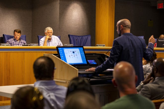 Alachua County Commissioners Ken Cornell and Robert Hutchinson ask presenters questions during the Alachua County Commission meeting on Wednesday. The cities of Newberry, Hawthorne and Gainesville proposed potential locations for the new Alachua County Fairgrounds. 

[Lauren Bacho/Staff photographer]