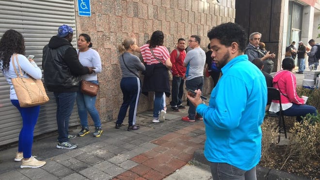 Long lines are a daily occurrence at the offices of Mexico’s asylum agency, COMAR, which is overwhelmed with asylum requests, but lacks funding and personnel. (JEREMY SCHWARTZ / AMERICAN-STATESMAN STAFF)