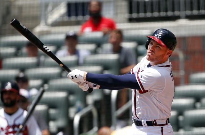 Atlanta Braves first baseman Freddie Freeman will participate in Monday's Home Run Derby, where he will face Nationals' slugger Bryce Harper in the first round. (AP Photo/John Bazemore)
