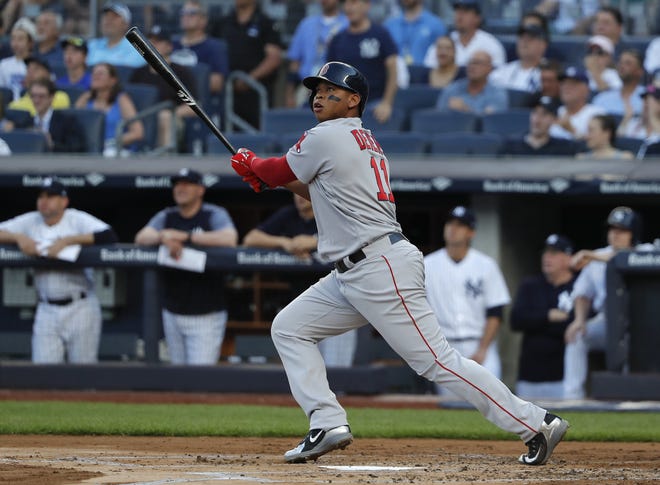 Red Sox third baseman Rafael Devers, shown hitting a grand slam against Yankees on June 30, was placed on the disabled list with left shoulder inflammation. [AP Photo/Julie Jacobson]